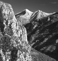 Graphic black and white photograph of dramatic Rindomo Gorge in Greece