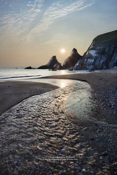 Dramatic print of rock formations and coastal scenery in Devon