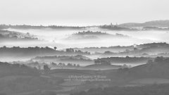 View of landscape with mist stretching from Dartmoor to Torquay on the coast