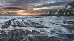 Beautiful sunset seascape taken from Westcombe Bay in Devon