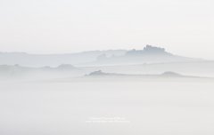 Artistic impression of Hound Tor on Dartmoor in mist