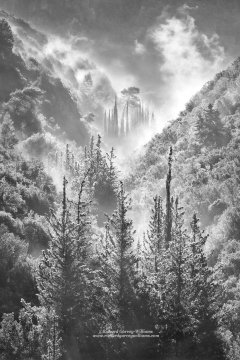 Monochrome photo of mist rising in the depths of the Rindomo Gorge between Kalamata and Kardamili
