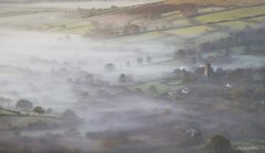 Misty landscape photograph of Dartmoor